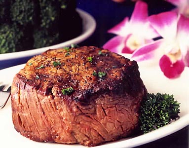 Nice steak.  Call me when you've breaded it, fried it, and smothered it with gravy.  You can go ahead and replace them flowers with biscuits, while you're at it.